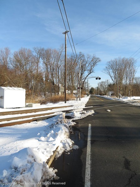 Snowy Railroad tracks Crossing Road Dan Antion