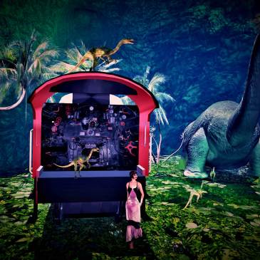 Lulu in front of train's caboose with dinosaurs