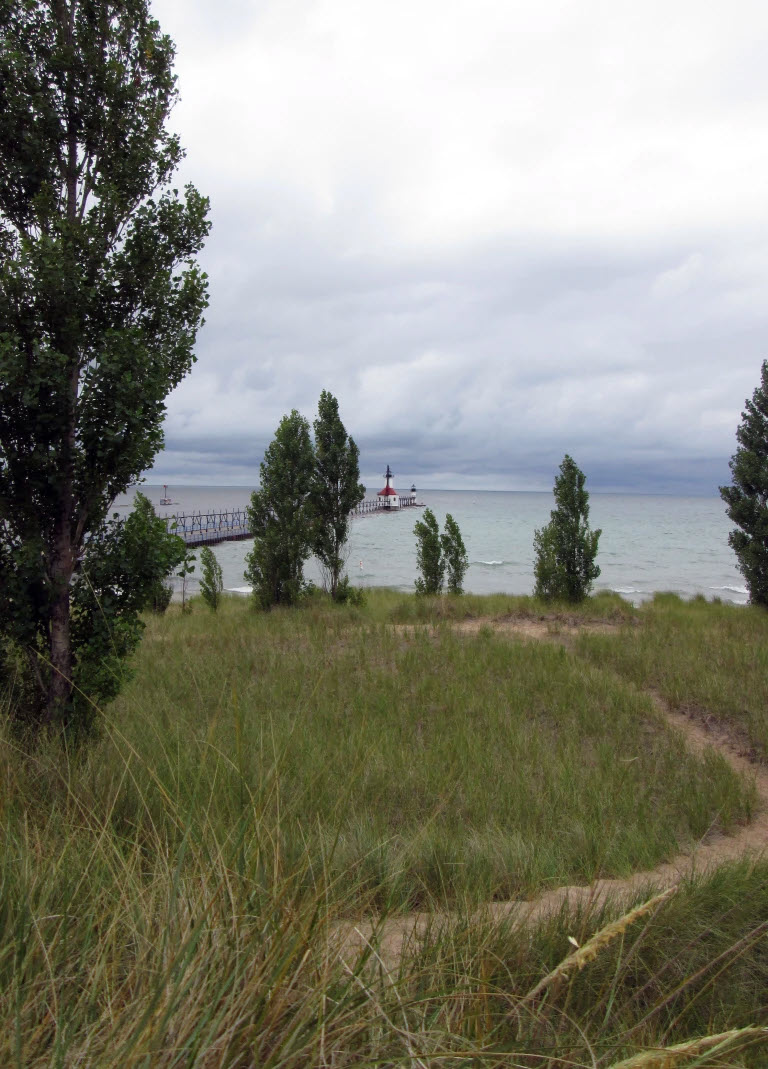 Distant view of North Pier Lighthouse Lake Michigan BY WHEAT, SALT, WINE AND OIL BLOG