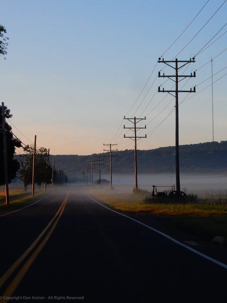 Fog across road Telegraph poles Dan Antion