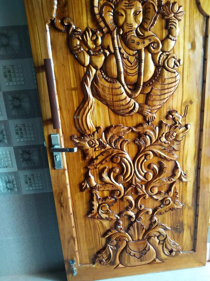 Ganesha Carved wood door Dreamstime