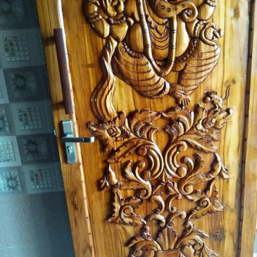 Ganesha Carved wood door Dreamstime