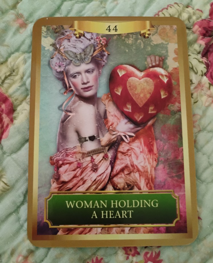 Energy Oracle card Woman Holding a Heart