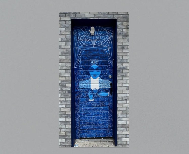 2026-TDWC Resa McConaghy Blue mural door with ceramic hand
