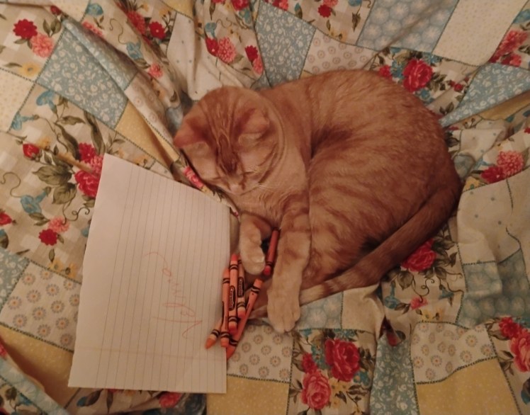 Velma with orange crayons